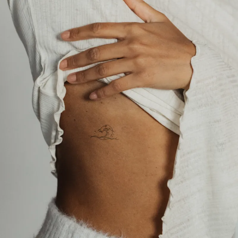 PAUL HEWITT Tattoo Medium | Tattoo Medium>Wave Tattoo
